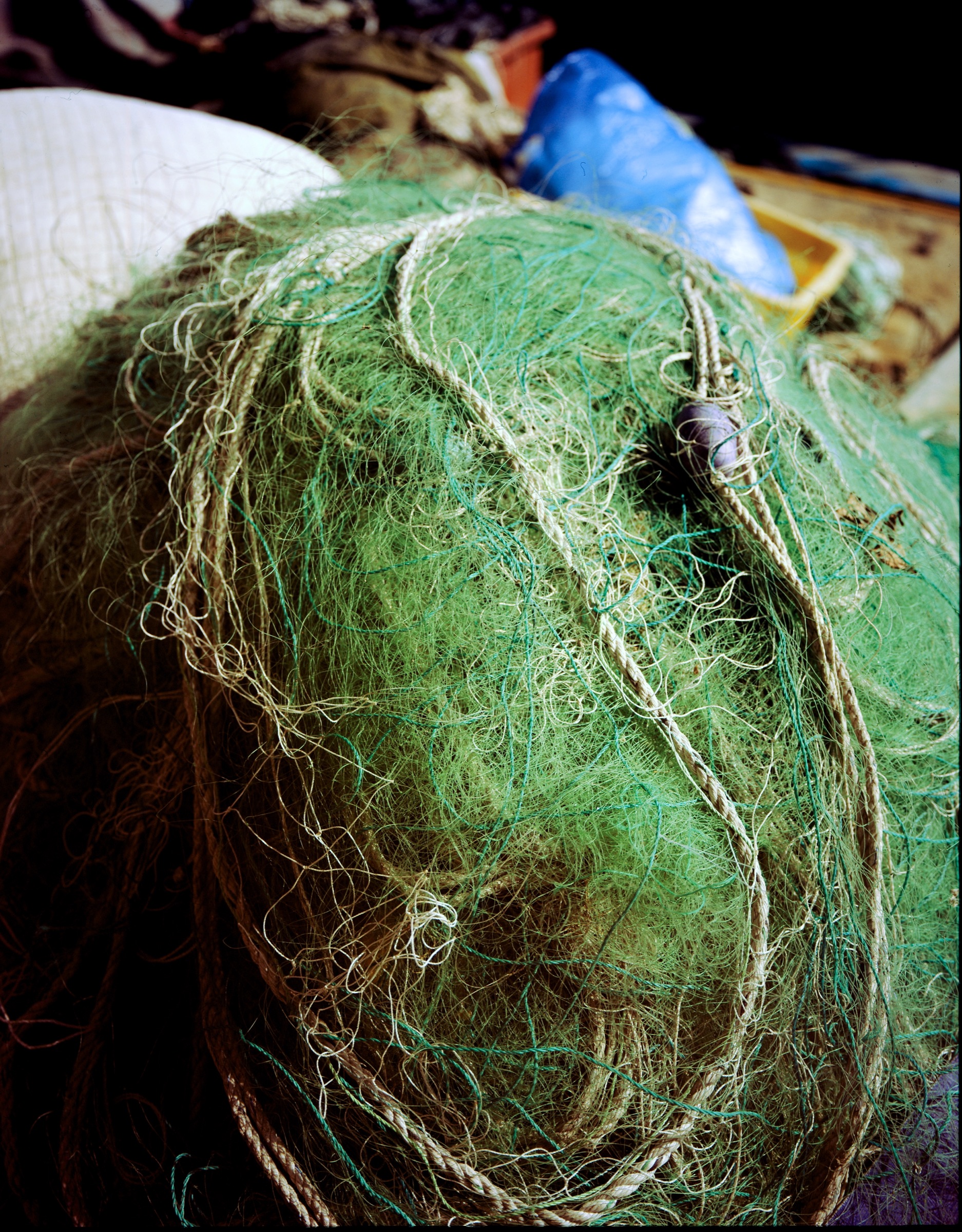 Tangled fishing nets in green and blue — SL45 + Grandagon 90 mm on 4×5 sheet Provia 100F
