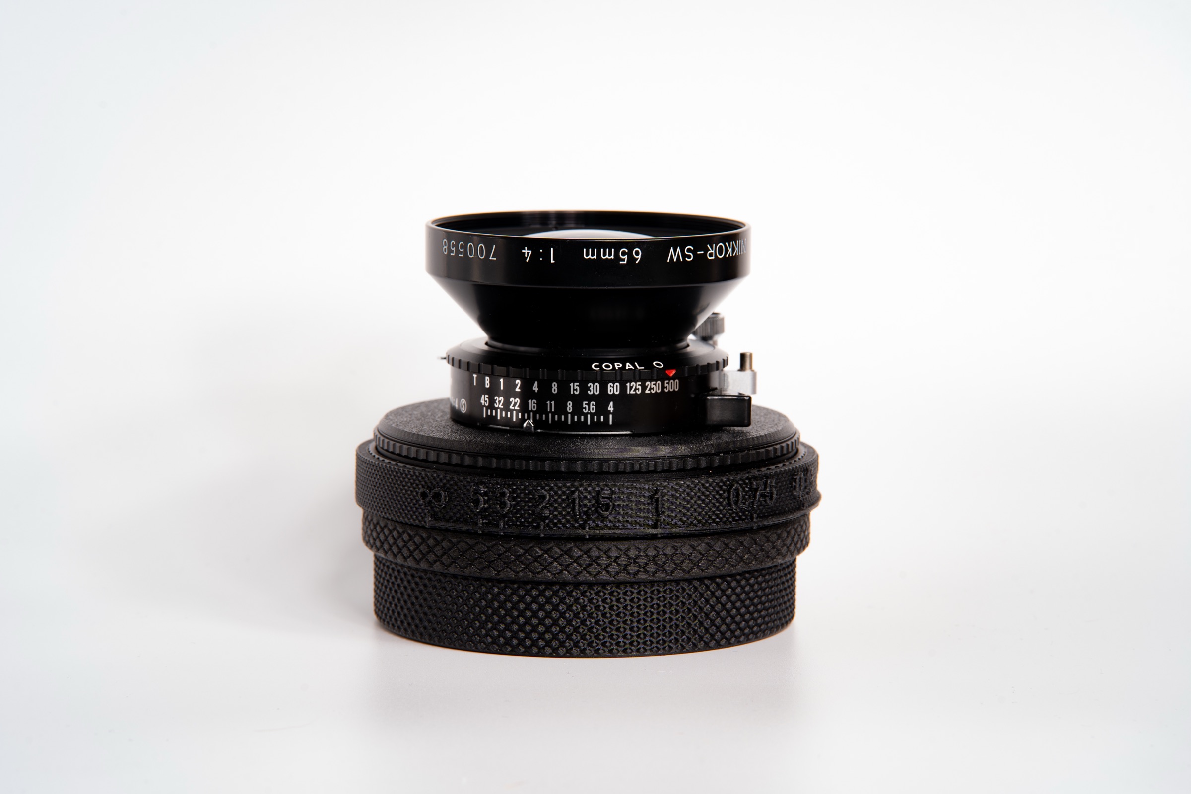 Nikkor SW 65 mm f/4 in custom O.ZONE helicoid